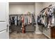 Large walk-in closet with ample hanging space, shelving, and storage for an organized wardrobe, maximizing space at 697 Gamble Oak St, Brighton, CO 80601