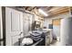 Functional unfinished basement with laundry area and storage at 982 E 130Th Cir, Thornton, CO 80241