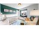 Charming bedroom with a modern color scheme, a comfortable seating area, and cozy furnishings for relaxation at 982 E 130Th Cir, Thornton, CO 80241