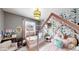 Whimsical ' bedroom featuring twin house beds, playful wallpaper, and cozy decor at 982 E 130Th Cir, Thornton, CO 80241