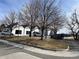 View of the community clubhouse with parking spaces available at 982 E 130Th Cir, Thornton, CO 80241