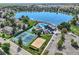 Aerial shot of community amenities including pool, tennis courts, sand volleyball, and a clubhouse at 982 E 130Th Cir, Thornton, CO 80241