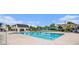 Outdoor pool with recreational clubhouse, seating, and play areas, designed for Gathering enjoyment at 982 E 130Th Cir, Thornton, CO 80241