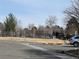 Community dog park with grassy areas, trees, and fencing for a safe and enjoyable space at 982 E 130Th Cir, Thornton, CO 80241