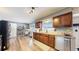 Well-appointed kitchen featuring hardwood floors, granite countertops, and stainless steel appliances for a modern feel at 982 E 130Th Cir, Thornton, CO 80241
