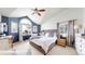 Spacious main bedroom with vaulted ceilings and large windows offering natural light at 982 E 130Th Cir, Thornton, CO 80241