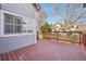 A wood deck with brown railings offering outdoor space for relaxation and enjoyment at 5960 S Jellison St # B, Littleton, CO 80123