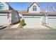 Well-maintained townhome with a two-car garage, tidy landscaping, and classic curb appeal in a desirable neighborhood at 5960 S Jellison St # B, Littleton, CO 80123
