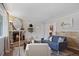 Cozy living room with a brick fireplace, light-filled interior, stylish furniture, and elegant decor at 1359 S Brentwood Way, Lakewood, CO 80232