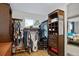 Organized walk-in closet featuring custom shelving, ample hanging space, and a bright window at 1359 S Brentwood Way, Lakewood, CO 80232