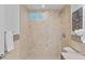 Tiled shower featuring tiled floor and wall accents at 1845 W 39Th Ave, Denver, CO 80211