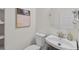 Bright bathroom featuring modern fixtures and a decorative painting at 1845 W 39Th Ave, Denver, CO 80211