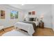 Inviting bedroom with hardwood floors, ample natural light, and stylish decor at 1845 W 39Th Ave, Denver, CO 80211