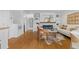 Bright living room with hardwood floors, fireplace, built-in shelves, and stylish decor at 1845 W 39Th Ave, Denver, CO 80211