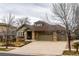Charming single-Gathering home with a well-manicured front yard and a spacious three-car garage at 25015 E Park Crescent Dr, Aurora, CO 80016
