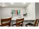 Wet bar featuring marble countertops, a sink, seating, and modern decor at 21492 E 60Th Ave, Aurora, CO 80111