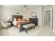 This main bedroom features neutral decor and a ceiling fan, creating a calming and inviting space at 21492 E 60Th Ave, Aurora, CO 80111