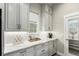 Charming kitchen with white countertops, cabinets, stainless steel appliances, and adjacent pantry at 21492 E 60Th Ave, Aurora, CO 80111