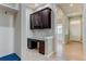 View of the entryway featuring a built-in desk, cabinets, and hardwood floors at 5514 Uinta St, Denver, CO 80238