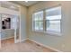 Comfortable office space with hardwood floors and natural light through large windows at 5514 Uinta St, Denver, CO 80238