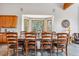 Dining room with a wooden table, seating for eight, and natural light at 384 Camron Ln, Breckenridge, CO 80424