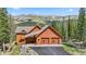 Charming mountain home with a two-car garage and stunning views of the surrounding landscape at 384 Camron Ln, Breckenridge, CO 80424