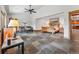 Spacious main bedroom boasts high ceilings, a seating area, a large bed, and natural light at 384 Camron Ln, Breckenridge, CO 80424