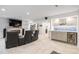 Finished basement with a stone fireplace, wet bar, and comfortable seating, perfect for entertaining and relaxation at 10681 Sundial Rim Rd, Highlands Ranch, CO 80126