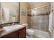 Cozy bathroom with tiled shower and granite countertops at 10681 Sundial Rim Rd, Highlands Ranch, CO 80126