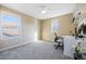 Bedroom with natural light and functional desk space at 10681 Sundial Rim Rd, Highlands Ranch, CO 80126