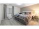 Comfortable bedroom with neutral tones, soft lighting, and ample space at 10681 Sundial Rim Rd, Highlands Ranch, CO 80126