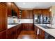 Modern kitchen features a large island with seating, stainless steel appliances, and ample cabinet space at 10681 Sundial Rim Rd, Highlands Ranch, CO 80126