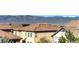 View of suburban neighborhood with mountain backdrop at 10681 Sundial Rim Rd, Highlands Ranch, CO 80126