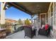 Covered patio with views of the surrounding neighborhood at 10681 Sundial Rim Rd, Highlands Ranch, CO 80126