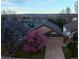 Aerial view of a suburban home showing the roof, landscaping, and neighborhood at 17059 Motsenbocker Way, Parker, CO 80134