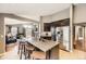 Spacious kitchen island featuring stainless steel appliances with an open floor plan at 17059 Motsenbocker Way, Parker, CO 80134