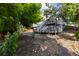 View of house with large wooden deck and yard at 607 Branding Iron Ln, Castle Rock, CO 80104