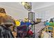This is a bedroom featuring lots of items on the bed and floor at 607 Branding Iron Ln, Castle Rock, CO 80104