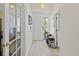 Bright entryway featuring tile flooring and a view of the front door, creating a welcoming first impression at 607 Branding Iron Ln, Castle Rock, CO 80104