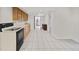 Kitchen area featuring tiled floors, cabinets and a view of the refrigerator at 607 Branding Iron Ln, Castle Rock, CO 80104
