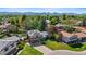 Bird's-eye view of a charming neighborhood boasting lush landscapes and captivating mountain vistas at 6975 S Wadsworth Ct, Littleton, CO 80128