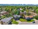 Residential area showing well-kept homes, verdant lawns, and mature trees, creating an inviting community at 6975 S Wadsworth Ct, Littleton, CO 80128