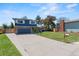 Charming two-story home with well-maintained lawn and beautiful landscaping at 6975 S Wadsworth Ct, Littleton, CO 80128