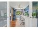 Stylish home office with built-ins, ample natural light and sliding barn door at 6975 S Wadsworth Ct, Littleton, CO 80128