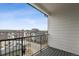 Private patio offers scenic views of the neighborhood and sky, ideal for relaxation at 487 Interlocken Blvd # 409, Broomfield, CO 80021