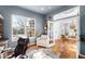 Bright home office with French doors and hardwood floors at 7291 Timbercrest Ln, Castle Pines, CO 80108