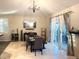 Bright dining room with sliding doors to patio at 1696 Avian Ct, Lafayette, CO 80026