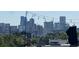 City views from rooftop area, with string lights and views of buildings in the city at 3404 W 18Th Ave, Denver, CO 80204