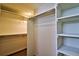 Spacious walk-in closet with built-in shelving and ample storage for clothing and accessories at 3404 W 18Th Ave, Denver, CO 80204