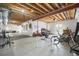 Unfinished basement providing ample space, exposed beams, and potential for customization at 11168 Sweet Cicely Dr, Parker, CO 80134
